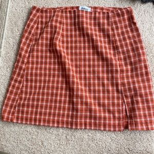 Princess Polly Orange Plaid skirt